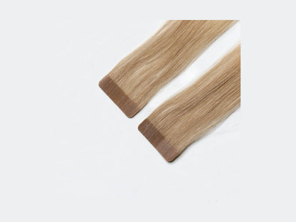Tape Extensions New York, närbild på det förtejpade fästet