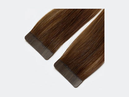 Tape Extensions Rom, närbild på det förtejpade fästet